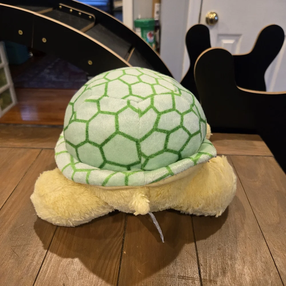 Plush Aurora Turtle Toy with Green Shell